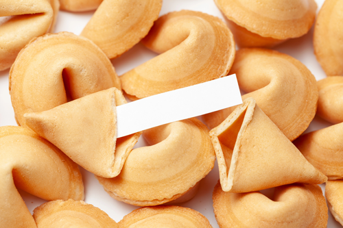 Fortune cookies with hidden paper messages symbolizing cross-cultural connections