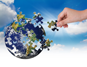 Globe and missing jigsaw pieces – symbolizing mergers that don’t quite fit